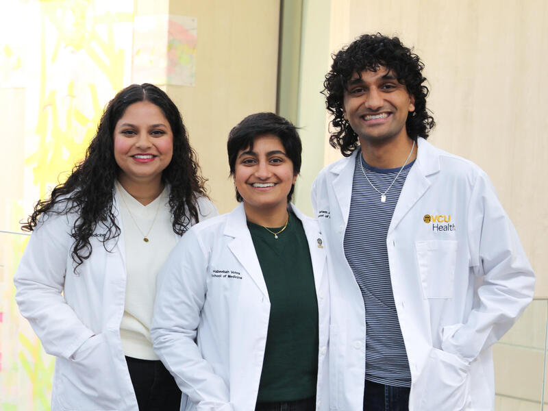 Hiba, Habeebah and Hisham Vohra (left to right), are all attending the School of Medicine at the same time. (Photo by Arda Athman, School of Medicine)