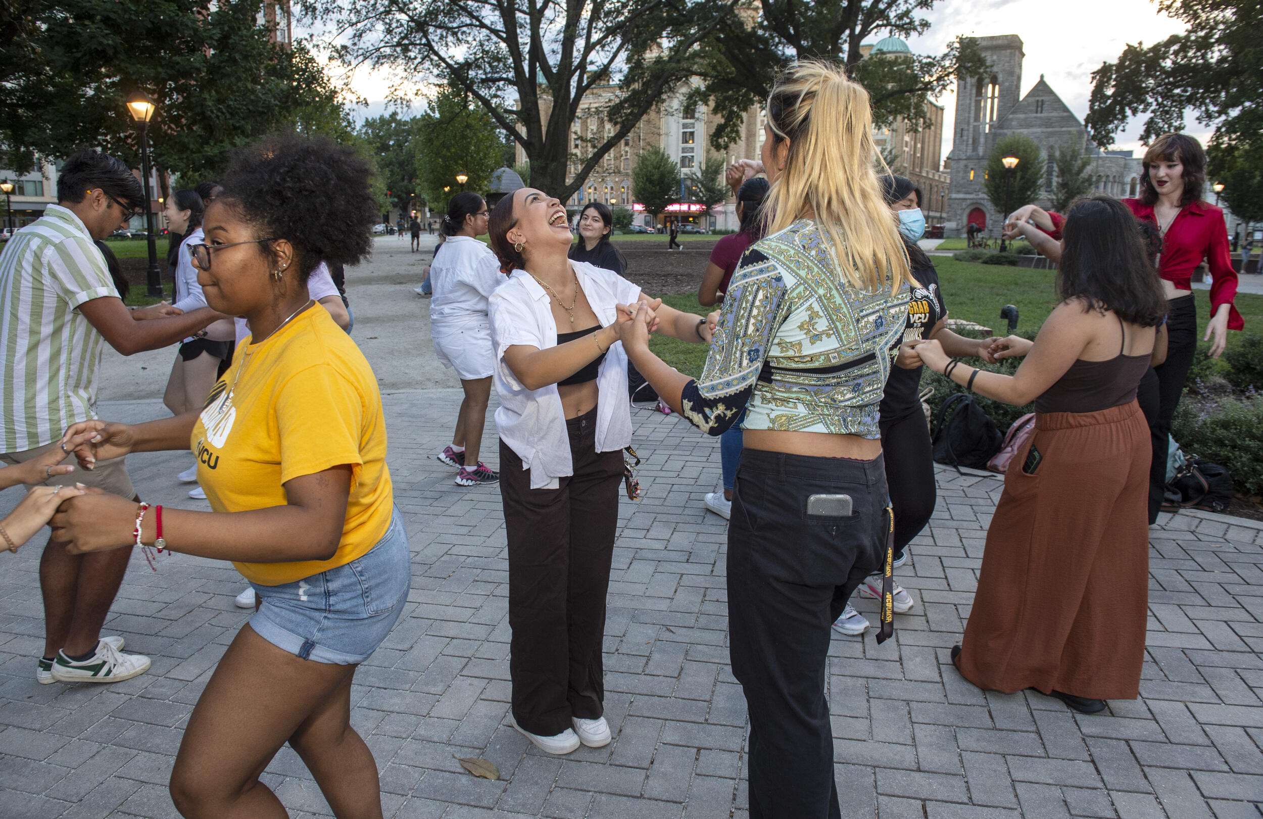 Students dancing in Monroe Park 