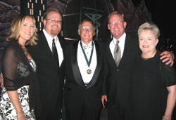 Dr. Drain (center) with his family. From left: daughter Kathryn Drain Ala of Midlothian, sons Stephen J. Drain and Timothy S. Drain of Texas and wife Cynthia M. Drain.