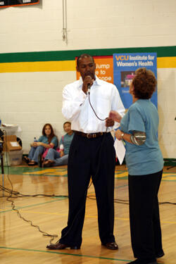 The VCU Institute for Women’s Health's Wendy Klein, M.D., (right) and Dr. Antoinne Exum, a School of Dentistry alum and basketball coach at Huguenot High School, answer health questions posed by the students. Photo by Martha M. Bushong, M.S., VCU School of Dentistry