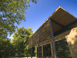 The conference room of the Walter L. Rice Education Building fills one end of the building, situated on the banks of the historic James River.