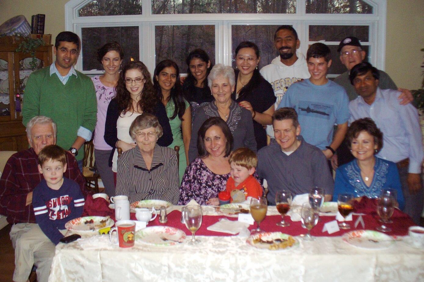 Saxena, in the green sweater and five other international students spent Thanksgiving 2012 with the Landrum family. 