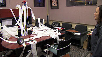 Disgruntled staffers (top) leave a special surprise for new boss — and former co-worker — Lisa Figueroa (above) one morning in “VCU TV/HD Webisode 1: The New Boss” 
