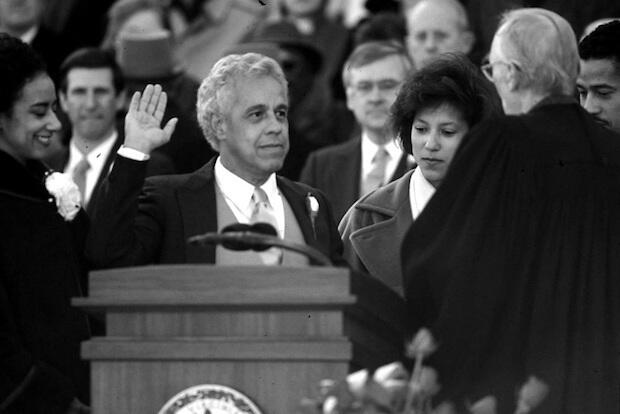 L. Douglas Wilder takes the oath of office during his 1990 inauguration.