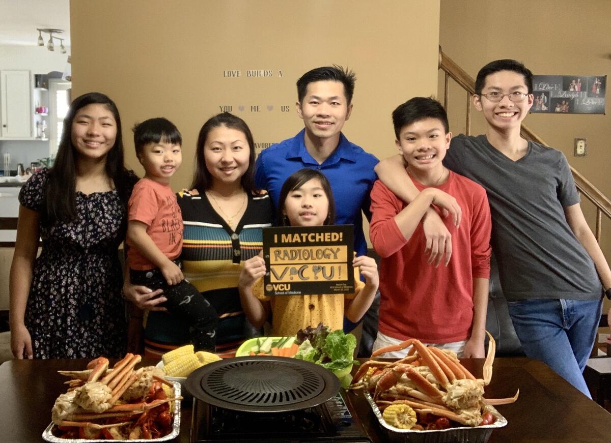 Jay Pham and his family inside their home.