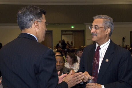 Dale Jones, Ph.D., associate professor of public administration and director of the National Homeland Security Project, chats with Congressman Bobby Scott, whose district includes VCU, between sessions. 