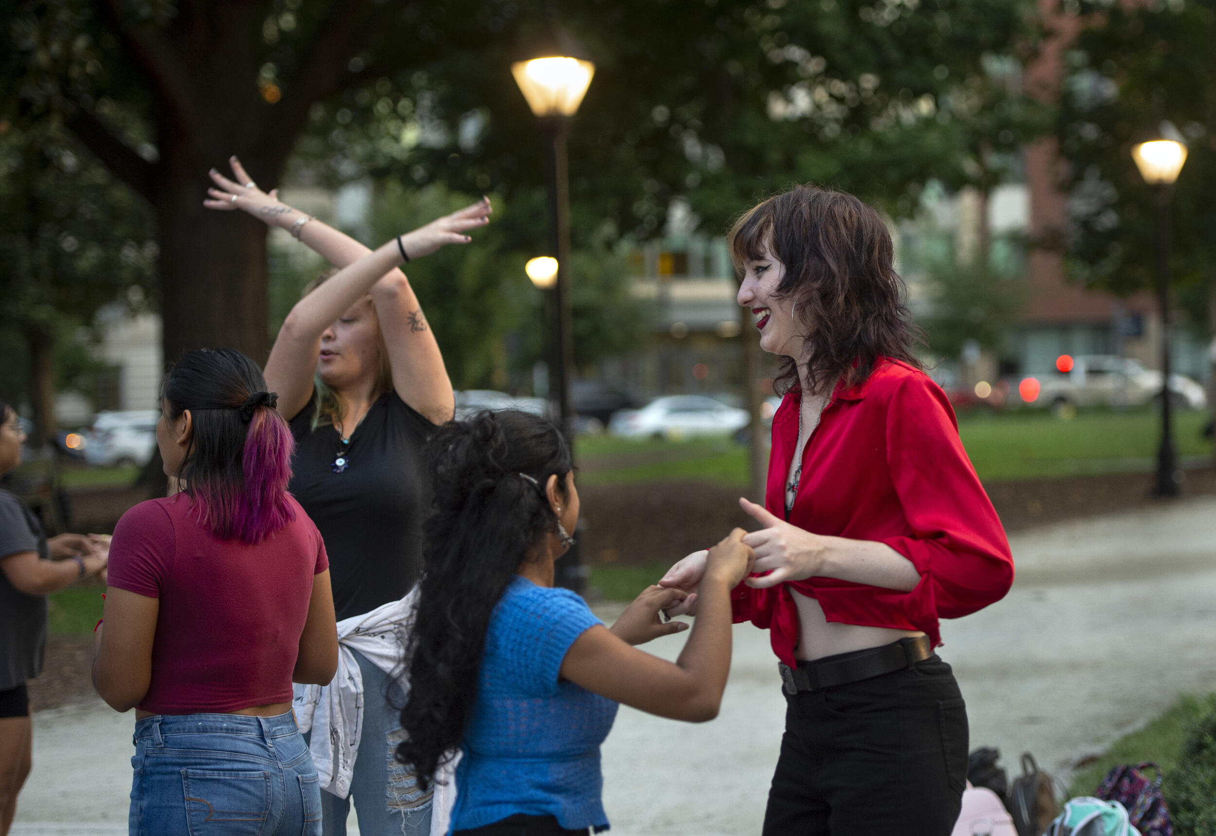 Students dancing in Monroe Park