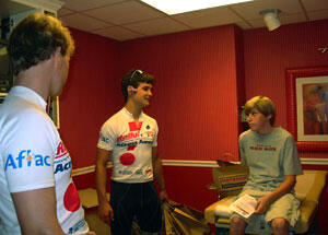 Tom Reardon (left) and Austin Bauman visit with Connor Crowley in the ASK Pediatric Hematology/Oncology Clinic. Photo by Malorie Janis, VCU News Sevices
