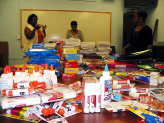 From left: VCU Staff Senate president LaForest F. Williams along with Staff Senate members La Von Jones-Jiles and Debbie Stewart, sort various school supplies donated by the VCU community in preparation for the delivery to Martin Luther King, Jr., Middle School.

Photo by Brooklyn Jones, University News Services