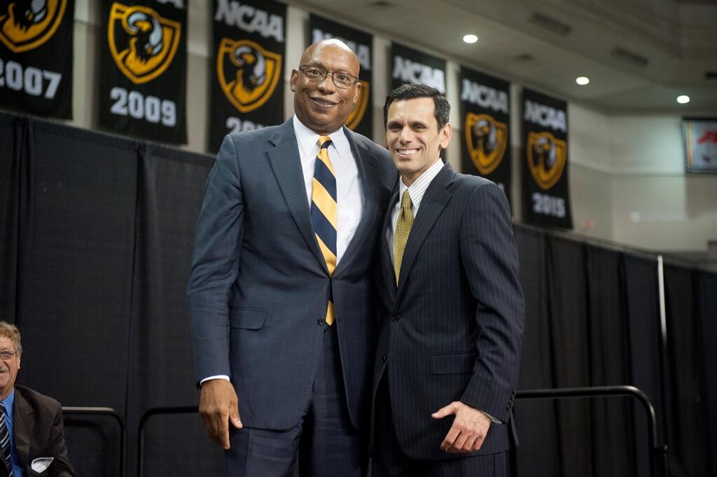 Napoleon Peoples, Ph.D., retired associate dean of student affairs for the VCU Health MCV Campus, (left) was honored with the President's Award for Excellence.