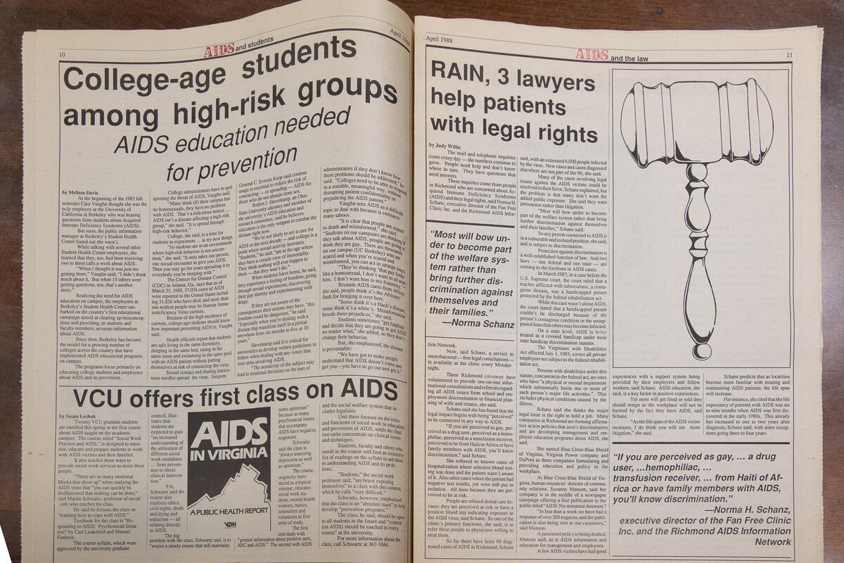 A photo of an old newspaper with stories about AIDS