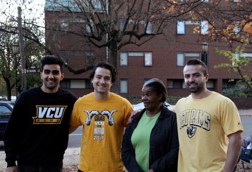 From left to right: VCU students Ashkhan Hojati, Daniel Mohammadi and Kevin Ghaffari, with Sarah, the first candidate to be helped by their organization, I RISE. Photo contributed by I RISE.