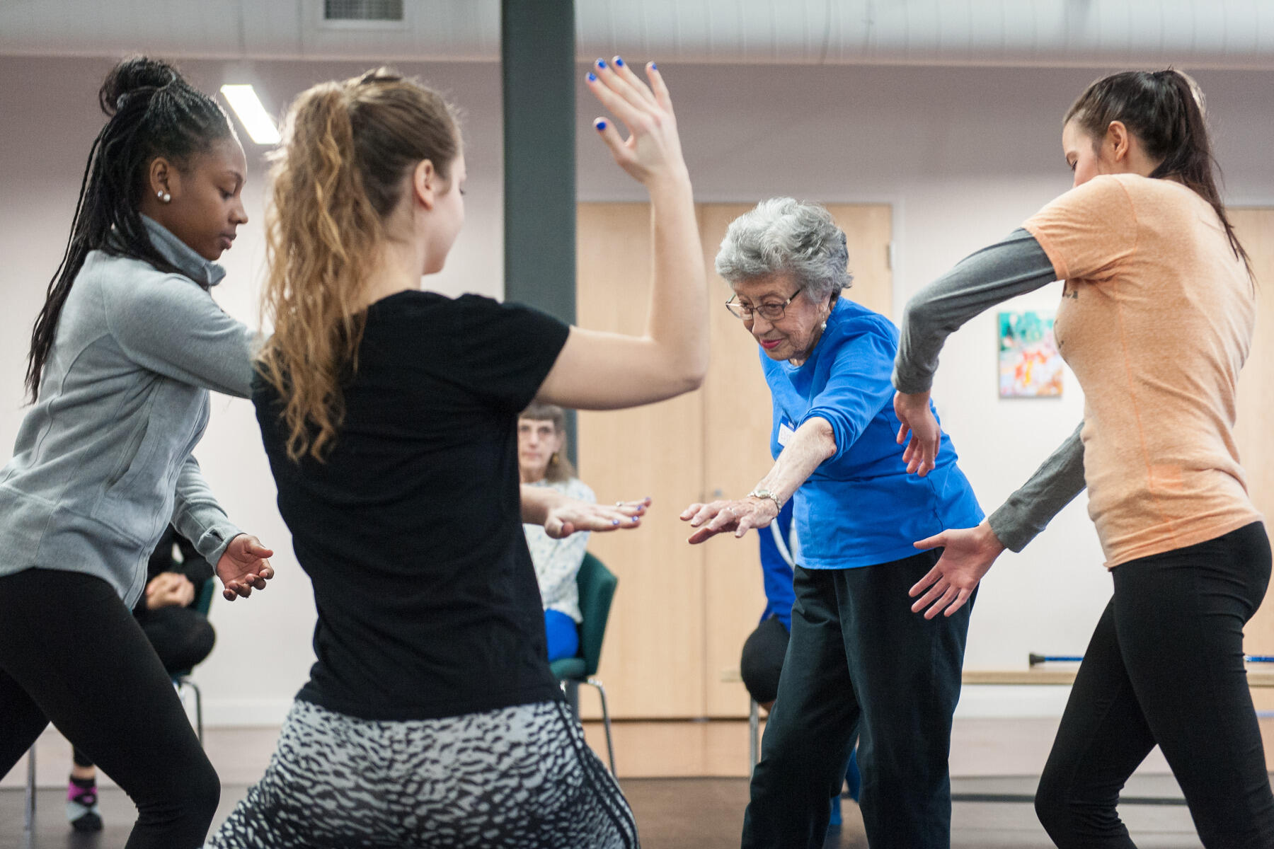 Edith Glock, 88, dances with VCU students on a Sunday morning class. “I like being with those young kids,” Glock said. “They’re adorable, and they put up with us.” 