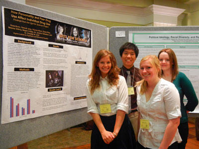 Undergraduate student researchers (from left to right): Rose Bono, Heesub Jang, Melanie Willing, and Sarah Rice share results of their Spit for Science study during VCU’s 2012 Student Research Week. 