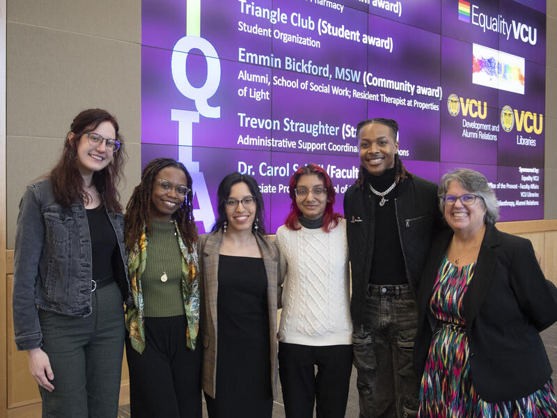 Left to right: Burnside Watstein Award recipients Emmin Bickford, an alum and a counselor with The Properties of Light; Aaliyah Freeman, Caroline Perez and AJ Jain, representing the Triangle Club at VCU; Tre Straughter, administrative support coordinator with University Student Commons; and Carol Schall, Ph.D., associate professor in the VCU School of Education. (Thomas Kojcsich, Enterprise Marketing and Communications)