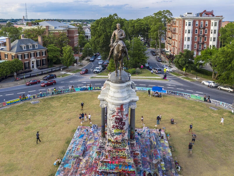 The Robert E. Lee monument in June 2020. VCU's Humanities Research Center brings together faculty and graduate students from different departments across VCU with common research interests. Among them: a new research group called Memory and Monuments, which seeks to investigate issues of race, power and memory, mainly focused around local Confederate monuments and African American landmarks. (Max Schlickenmeyer, University Marketing)