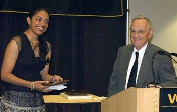 President Eugene P. Trani (left) presents the student award to Shivani Shodhan.

Photos by Creative Services