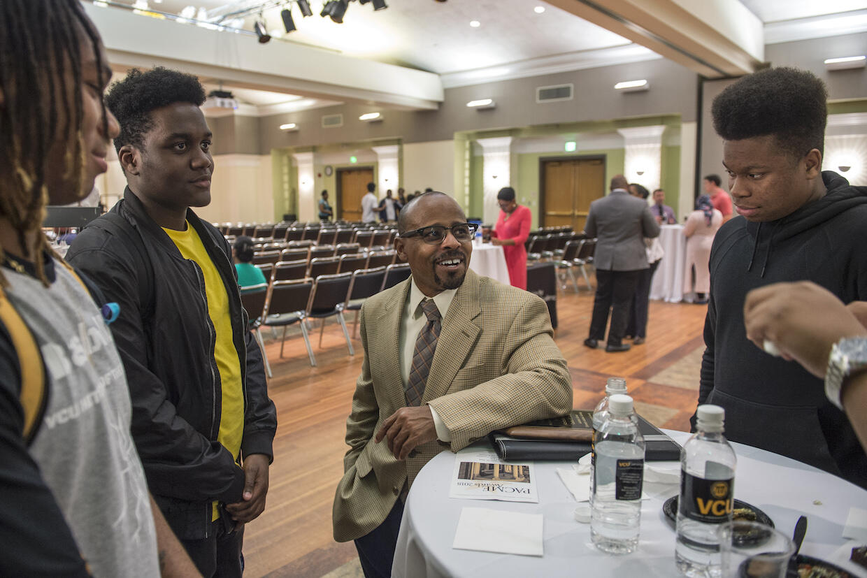Carlton Goode speaks with students at the event. (Photo by Kevin Morley, University Marketing)