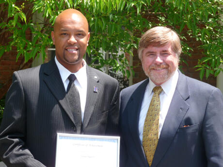 Damon Jiggetts, left, was class speaker for the 2008-2009 Emerging Nonprofit Leaders closing celebration at the Lewis Ginter Botanical Garden. Jiggetts works for Communities in Schools of Richmond, Inc., and is seen here with Harold Fitrer, Ed. D., the group’s executive director.  Photo by Mike Porter, VCU Communications and Public Relations.  
