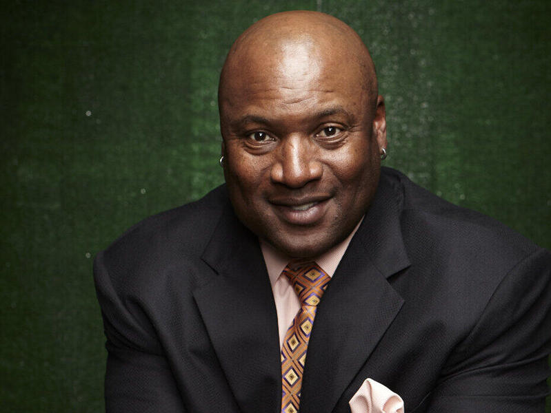 A photo of a man wearing a suit and tie. 