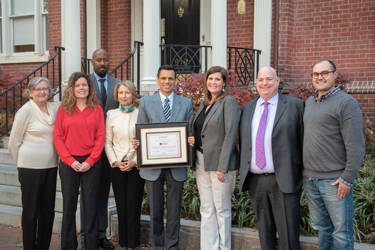 From left: Lucy Halunko, VCU Technology Services; Colleen Bishop, VCU Technology Services; Aashir Nasim, vice president for inclusive excellence; Nancy Scott, interim dean of VCUarts; VCU President Michael Rao; Kirsten Nagel, Adobe Customer Solutions; Alex Henson, chief information officer; Andrew Ilnicki, VCUarts.
