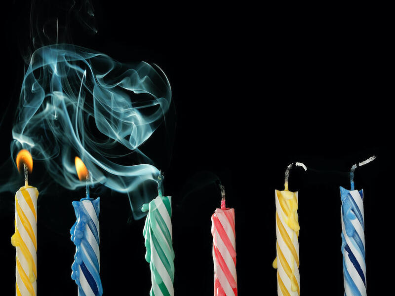 candles, some lit and some extinguished