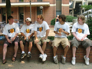From left: Aaron Martin, Brett Ellis, Jeff Knighton, Chris Hamrick and Chris Knighton from VCU's On-campus Housing Move-in Crew, wait outside of Rhoads Hall for the next wave of students needing assistance with the move. The crew was on hand to facilitate the students' moving experiences by helping to transport their belongings into the residence halls.