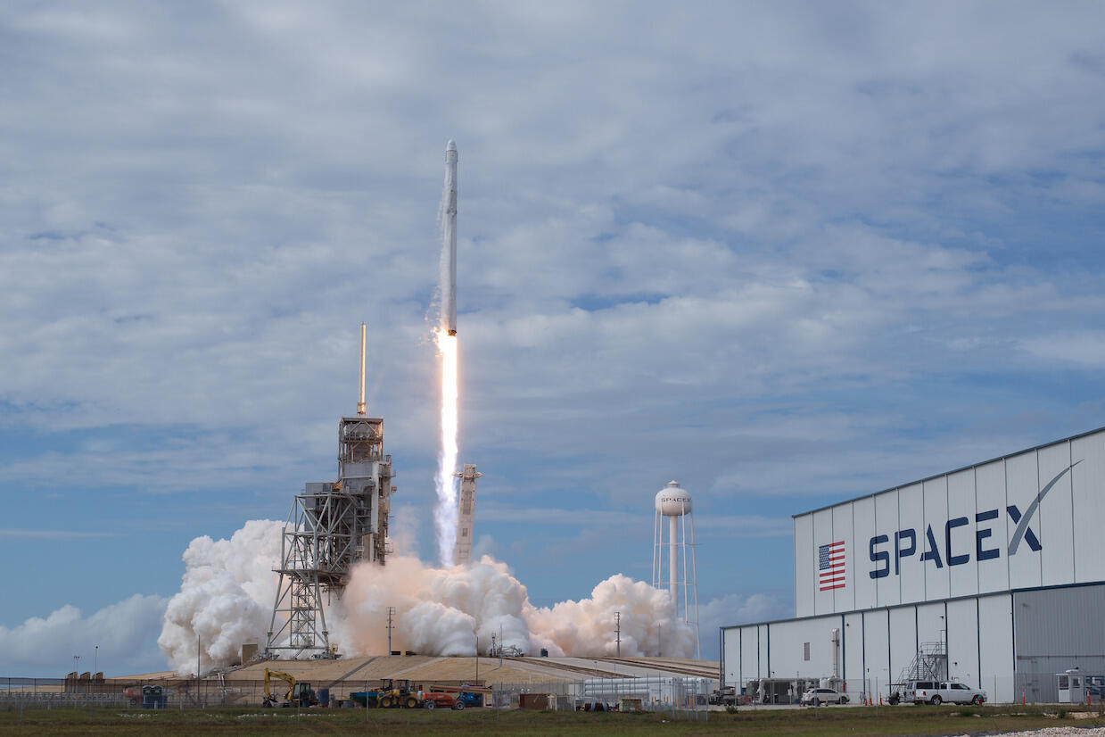 A SpaceX Falcon 9 rocket lifts off fro NASA's Kennedy Space Center.