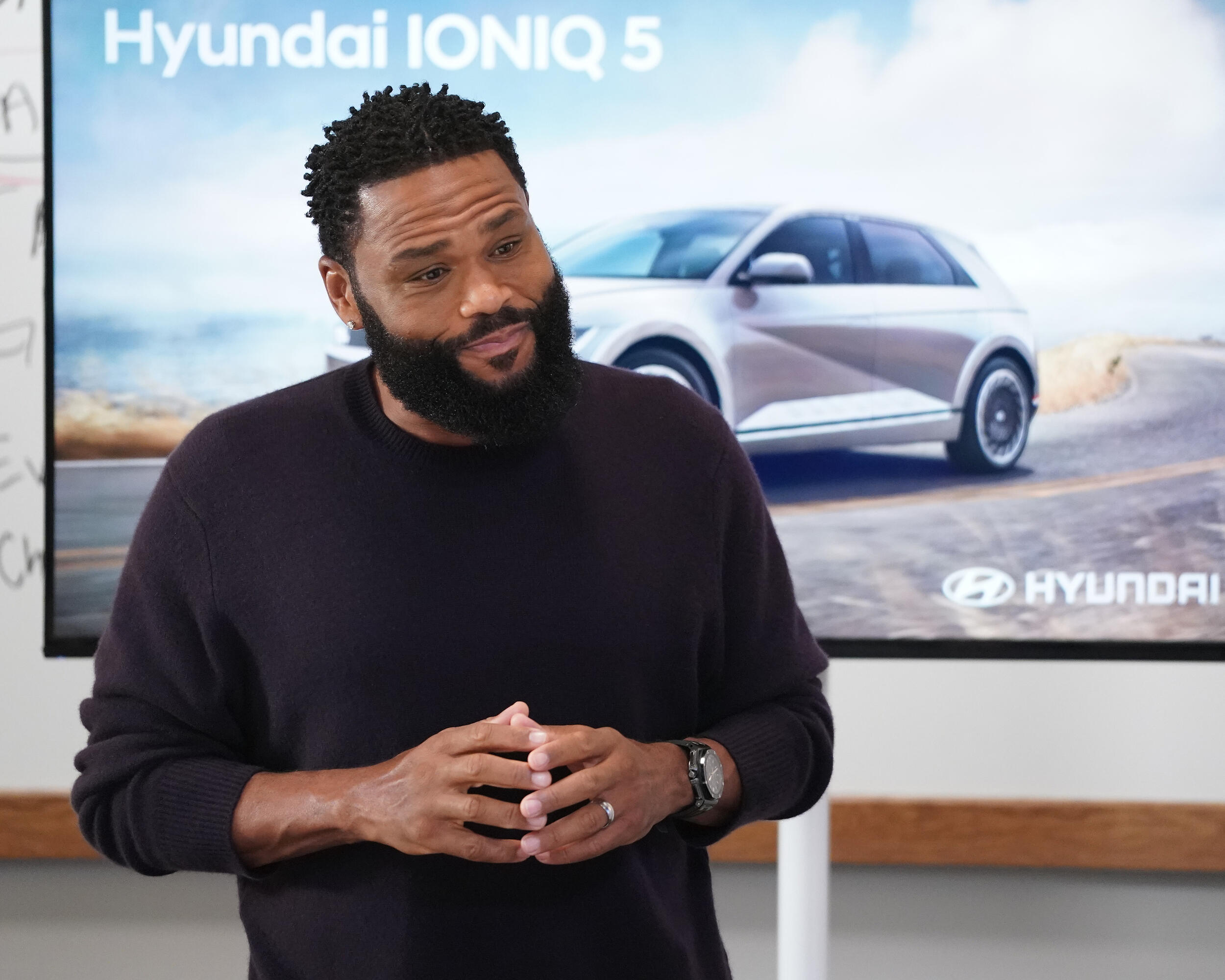 Dre Johnson (Anthony Anderson) pitches an ad concept for Hyundai’s IONIQ 5 Super Bowl commercial on ABC's \"Black-ish.\" (Photo courtesy Disney General Entertainment)