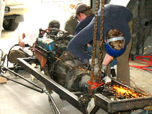 For their final project, mechanical engineering seniors built a t-bucket roadster inside the Department of Sculpture's machine shop. The exercise allowed students to apply their knowledge of engine design, thermodynamics, heat transfer, materials fabrication and fluid flow.

Photo by Mike Frontiero, University News Services