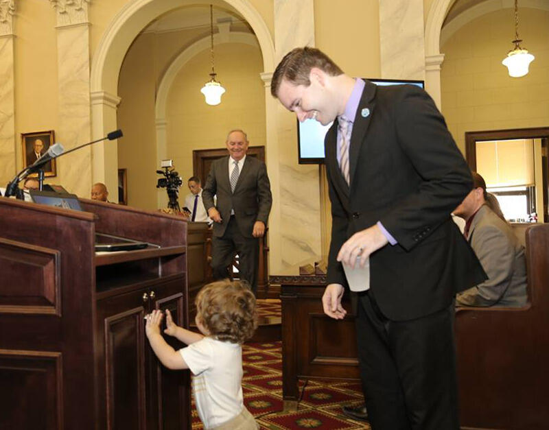 Vogler's son, Kingston, attended the swearing-in ceremony. Photo by Von Wellington Photography.