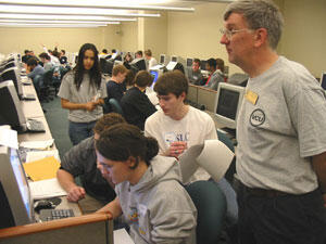 VCU Department of Computer Science Chairman James E. Ames, Ph.D., observes a team attempting to solve a programming problem during the contest.

Photos by Mike Frontiero, University News Services