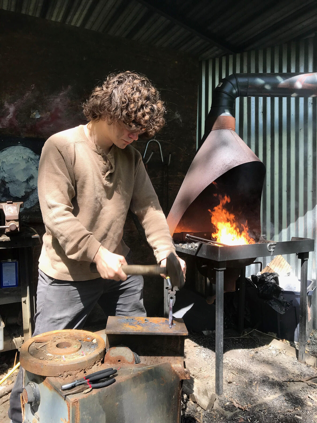 Adcock taught himself bladesmithing and built his own forge and anvil. (Photo courtesy of Jesse Adcock)