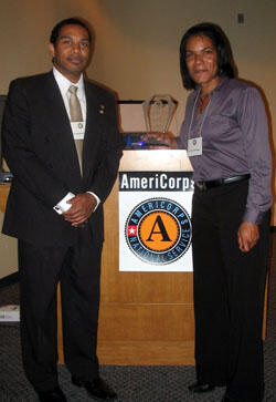 “A Perfect 10! VCU AmeriCorps worker Cheryl Jennings (right) was described as a “10” on a scale of one to10 by staffers at the Richmond elementary school where she supports children.  The Governor’s Commission for Community and National Service recognized Jennings with the 2007 Robert E. Wone Award for Exemplary Service.  VCU AmeriCorps/America Reads Director Franklin Wallace (left) presented Jennings with the award.  Photo by Mike Porter/ VCU News Services."