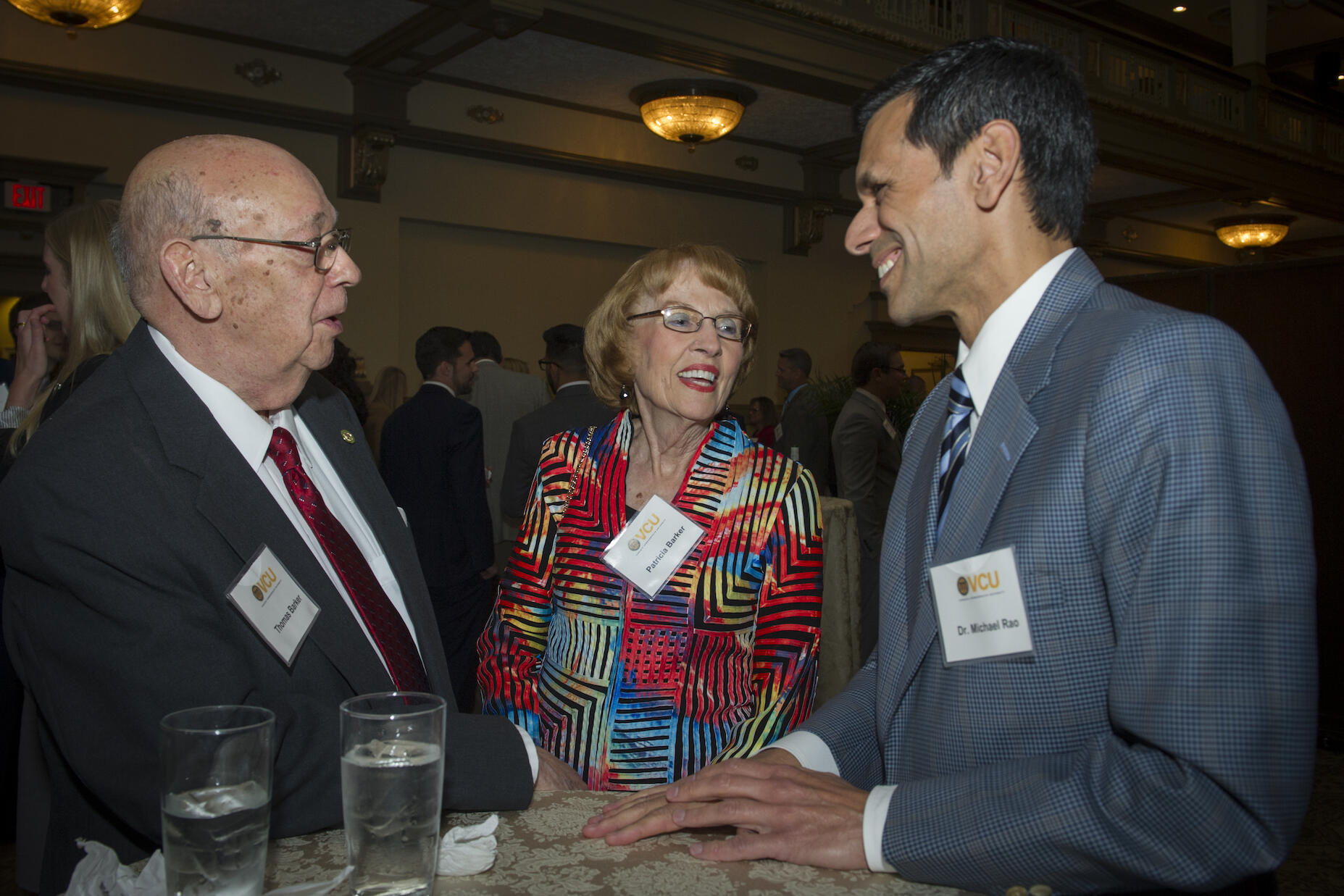 VCU President Michael Rao, Ph.D. (right), Thomas Barker, Ph.D. (left), and his wife Patricia (center).