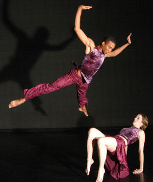Kenny Gillus and Rachel Hunter move through the space as if being urged by some unseen force in James Frazier's "Wind Colored Dark Like Midnight," to be presented this weekend at VCU Dance's 2004 Student/Faculty Concert.

Photo by Bruce Berryhill