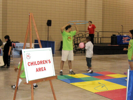The student-run fair also included a separate area for children, with health screenings, games and activities. Photo by Mike Porter, University Communications and Public Relations.