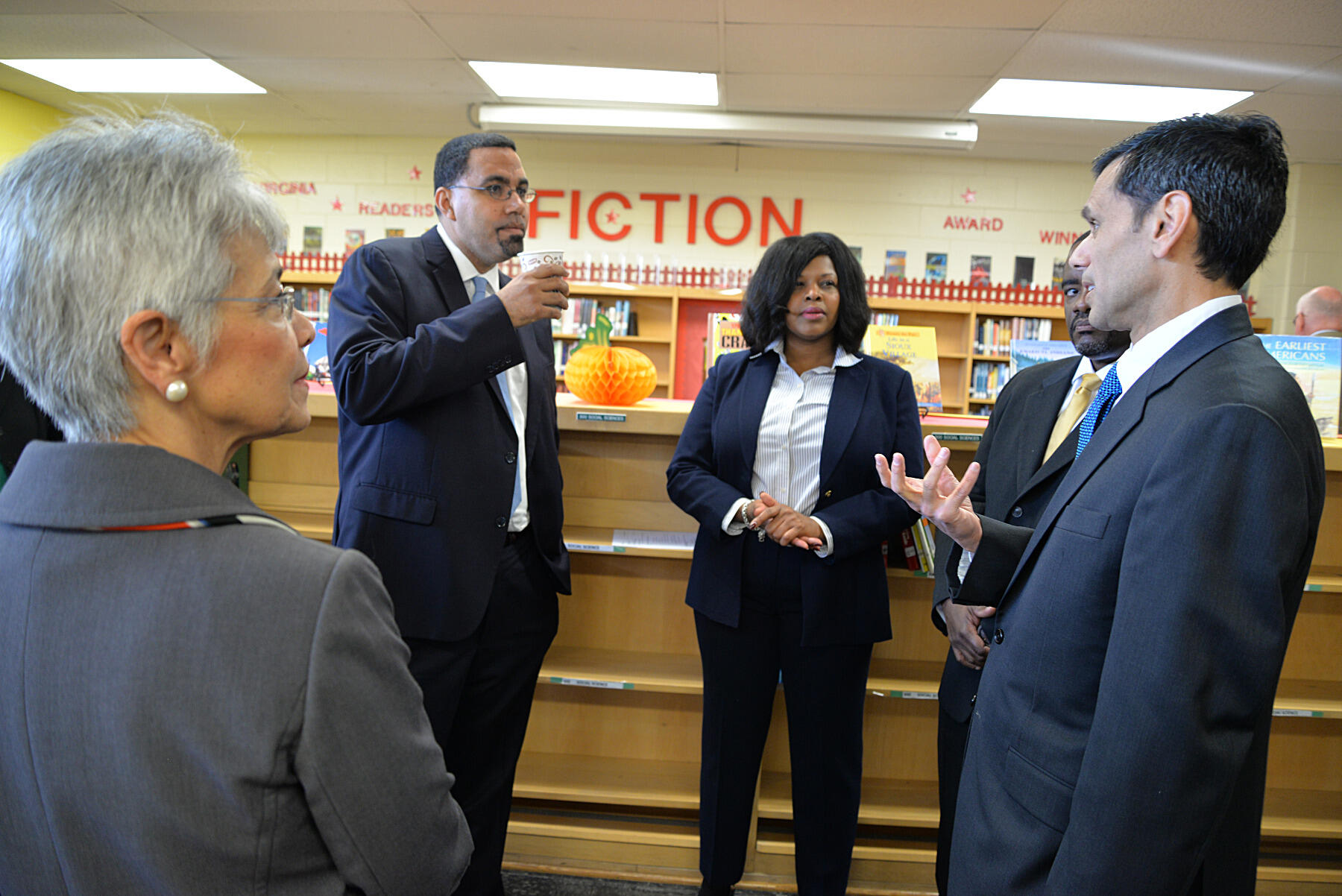 VCU President Michael Rao, Ph.D., (right) speaks with (from left) Therese A. Dozier, Ed.D., director of the Richmond Teacher Residency program; U.S. Secretary of Education John B. King Jr.; Elkhardt-Thompson Middle School Principal Jacquelyn Murphy, Ed.D.; and VCU School of Education Dean Andrew P. Daire, Ph.D.
