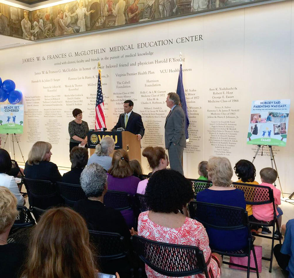 Michael Rao, Ph.D., president of VCU and the VCU Health System, speaks as Virginia Secretary of Education Anne Holton and Gov. Terry McAuliffe listen during an event at VCU's James W. and Frances G. McGlothlin Medical Education Center.