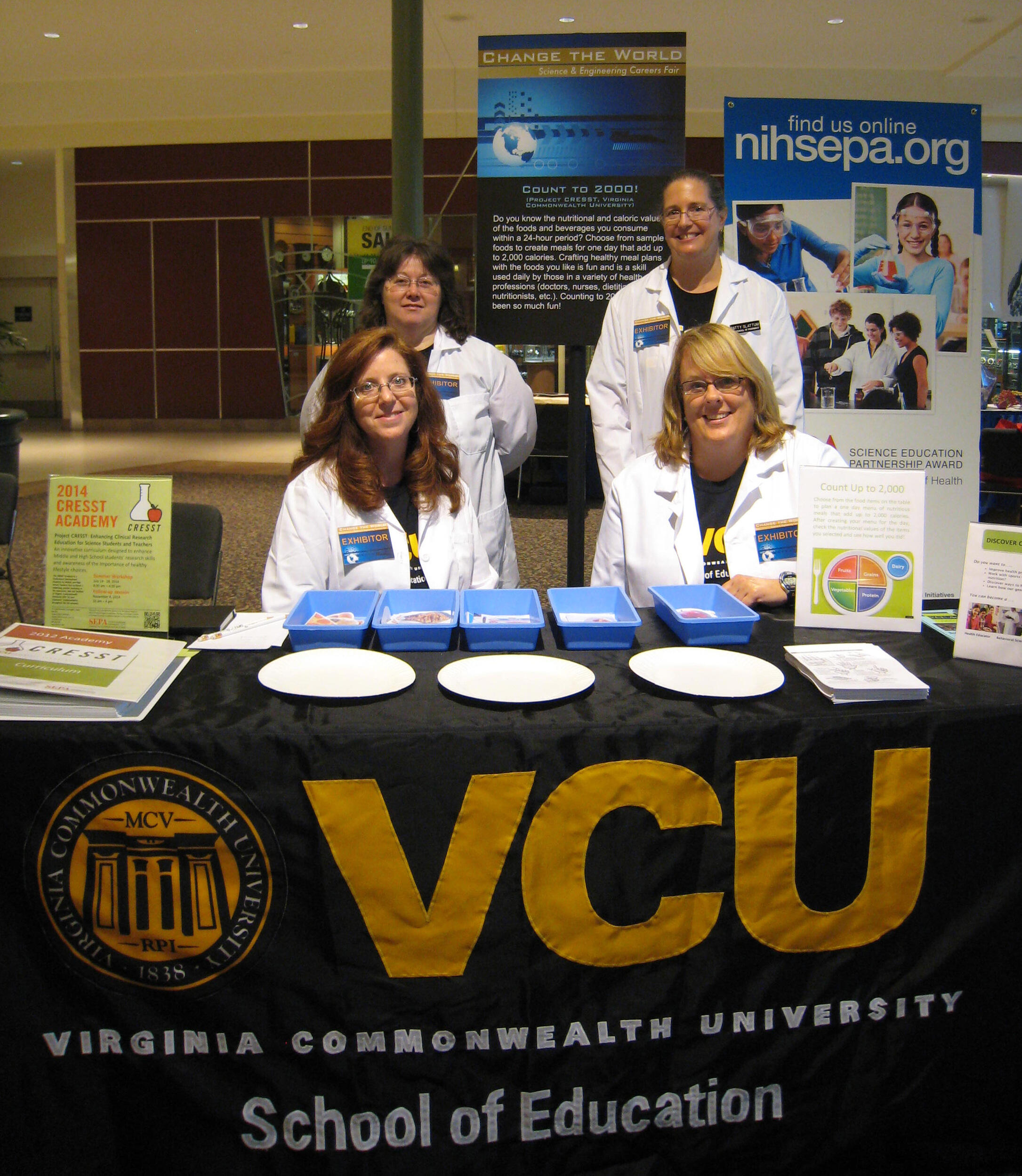 The CRESST team attends the World Science & Engineering Careers Fair in Northern Virginia, in spring 2013. From left to right: Tammy McKweon, Ph.D. student, School of Education; Lisa Abrams, Ph.D, interim chair, Foundations of Education Department in the School of Education; Suzanne Kirk, CRESST coordinator; and Patricia Slattum, Pharm.D., Ph.D., VCU Pharmacy