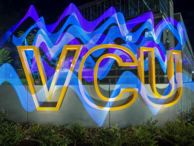 A nighttime view of the new VCU letters at the corner of Harrison and Main streets. (Kevin Morley, University Marketing)