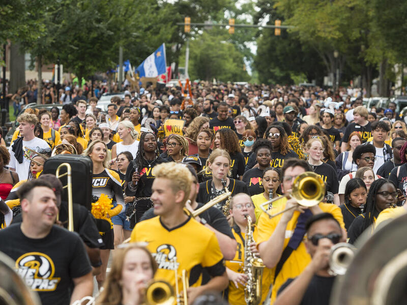 Last month new students marched down the streets during Spirit Walk, an annual tradition at the start of the school year. (Kevin Morley, University Marketing)