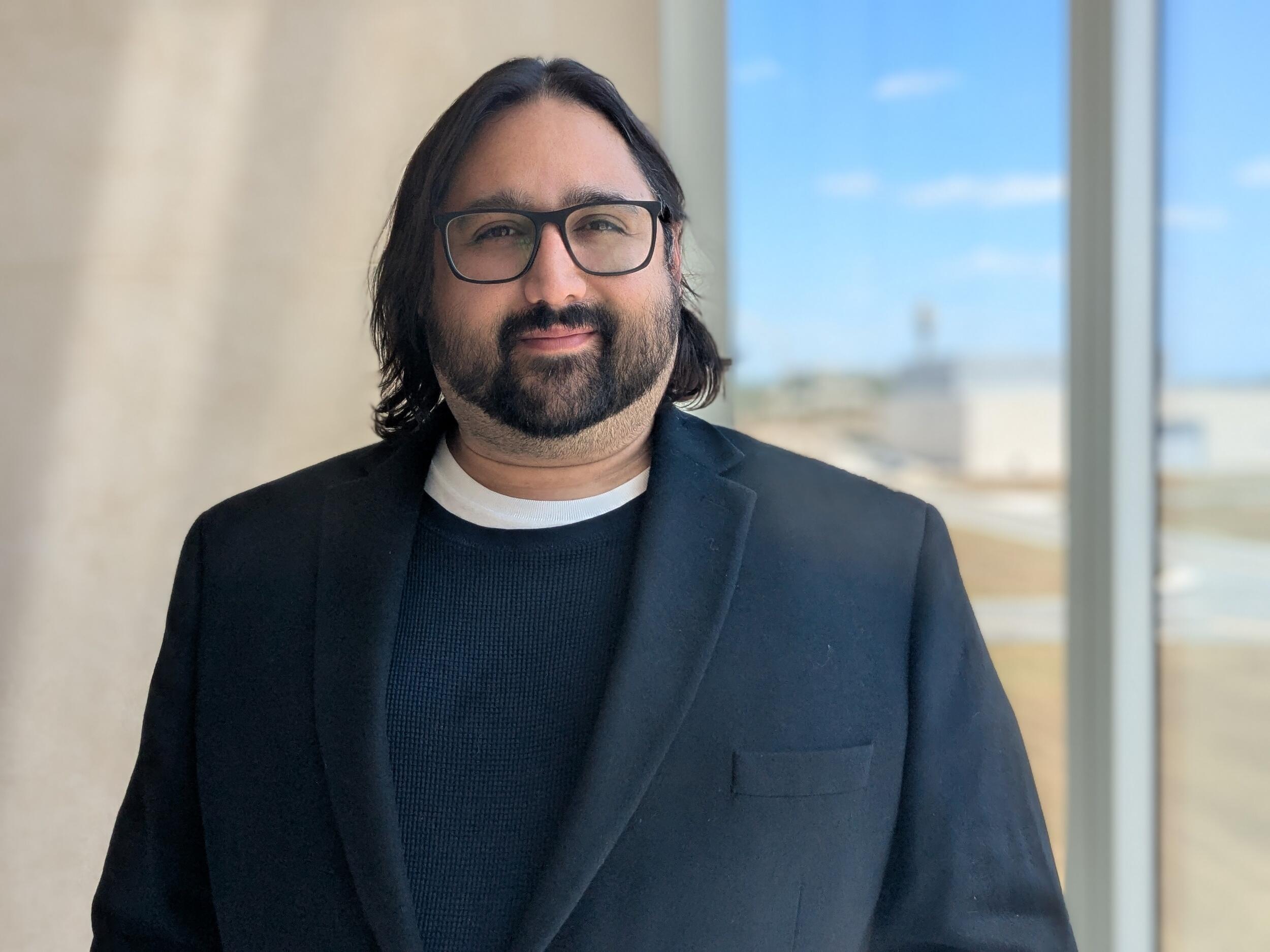 A photo of a man from the chest up