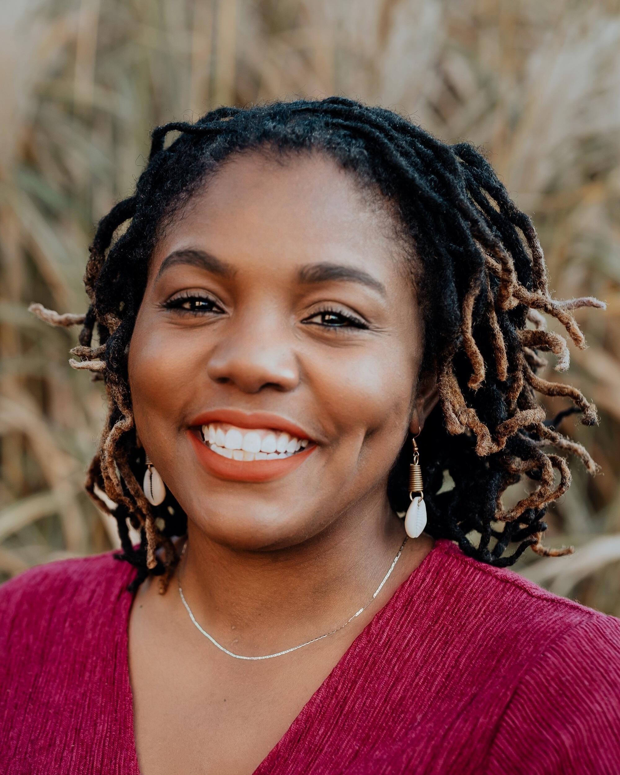 A headshot of Danielle Apugo, Ph.D., assistant professor in the VCU School of Education, studies the educational experiences, epistemologies, culture, resistance and intellectual uprising of Black women and girls in the U.S.