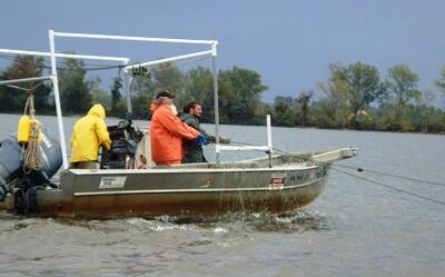 VCU researchers on board a boat along the James River in search of Atlantic sturgeon.