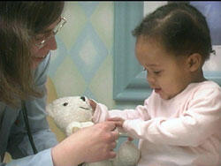 Dr. Linda Meloy helped her patient check on the condition of her stuffed friend for the camera. Video for the commercial was shot in the ASK Hematology/Oncology Clinic, the Pediatric Pulmonary Clinic, and in the playroom and Pediatric Intensive Care Unit on the 7th floor of Main Hospital.

Images by Joe Kuttenkuler, University News Services