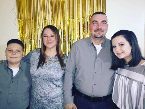 Buddy Hughes pictured with his wife and children. (Courtesy photo)
