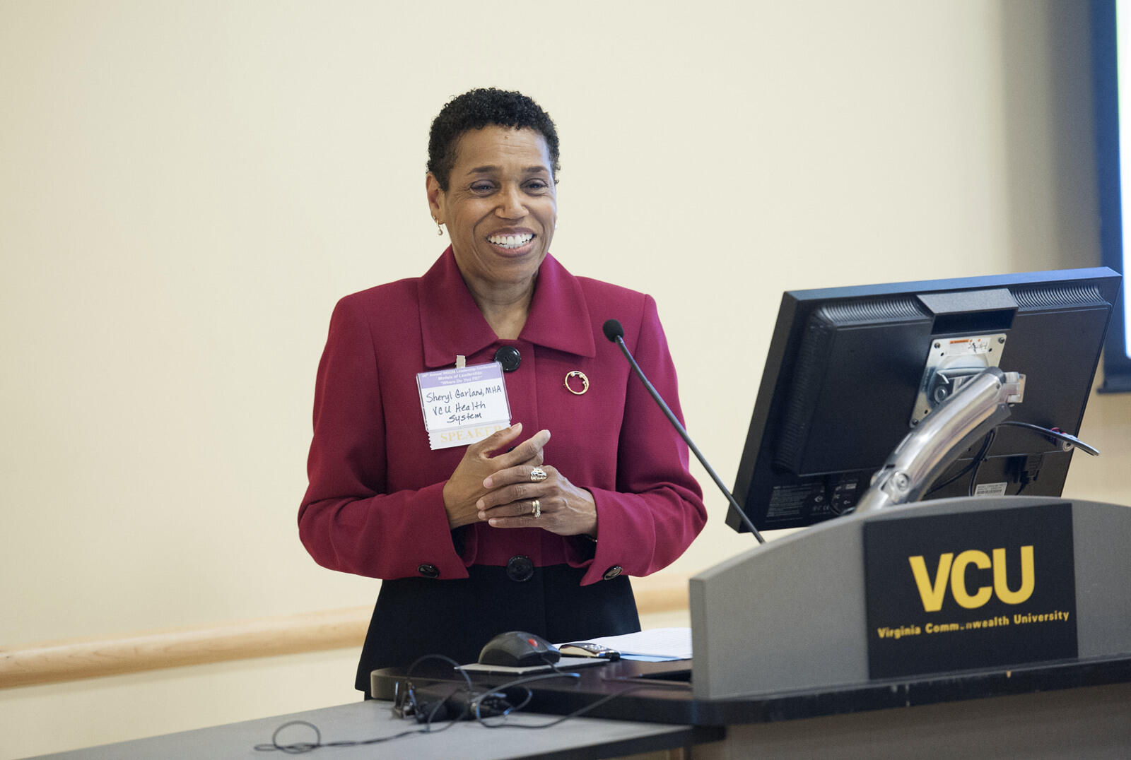 Sheryl Garland, vice president for health policy and community relations at VCU Health, addresses the audience at the 26th annual Women in Science, Dentistry, and Medicine conference. (Photos by Tom Kojcsich, University Marketing)