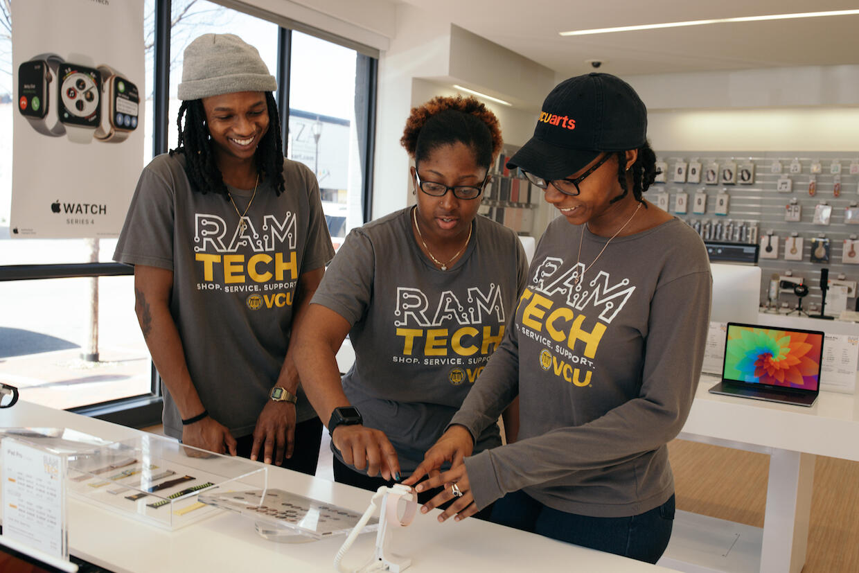 RamTech student employees Miles King, Bryttan Chandler and Brittany Dennis review new features on the Series 4 Apple Watch. (Photo courtesy of RamTech)