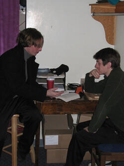 Undergraduate theater performance major Joe Carlson (left) talks with his mentor, Boone Hopkins, a graduate student in the theater pedagogy program in the box office at the Singleton Center for the Performing Arts. VCU’s Graduate School Mentorship Program exposes undergraduates to the graduate student experience and allows graduate students to sharpen their mentoring skills. Photo by Mike Porter/VCU Office of University News Services